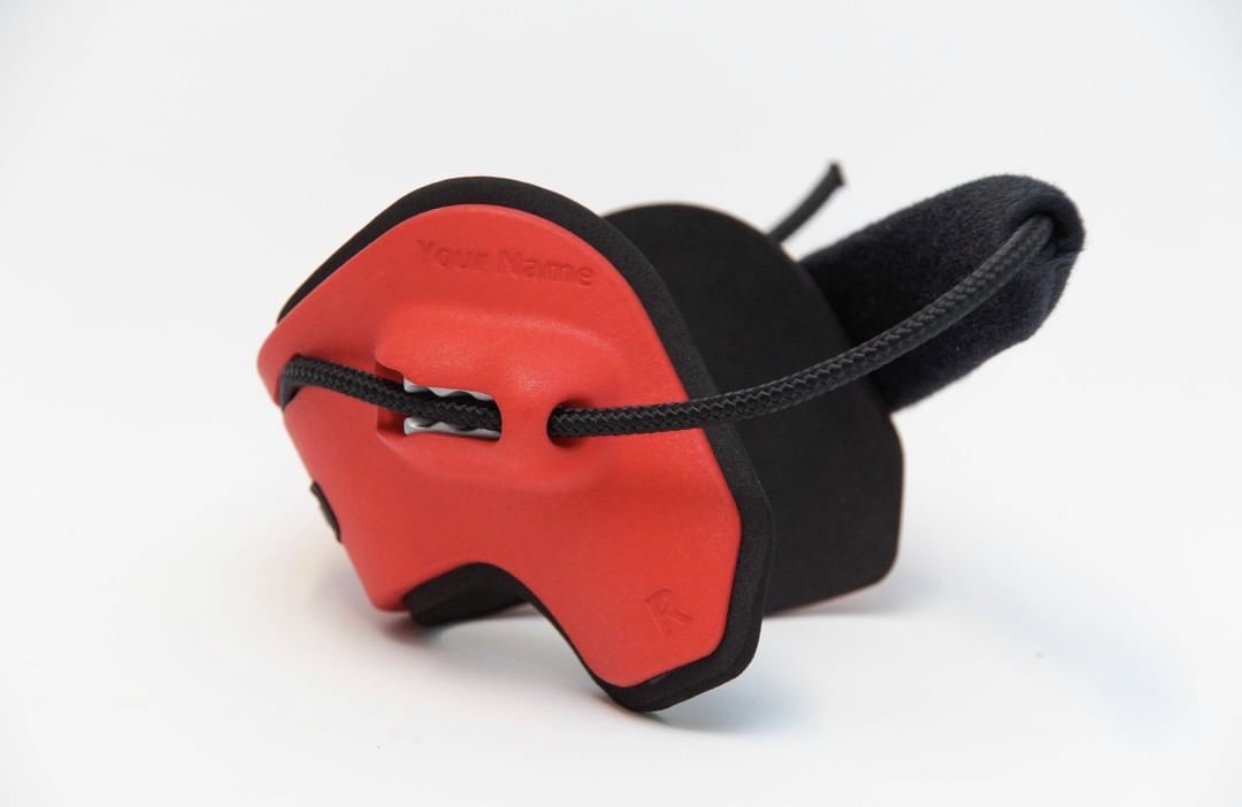 A red EXO-L ankle brace