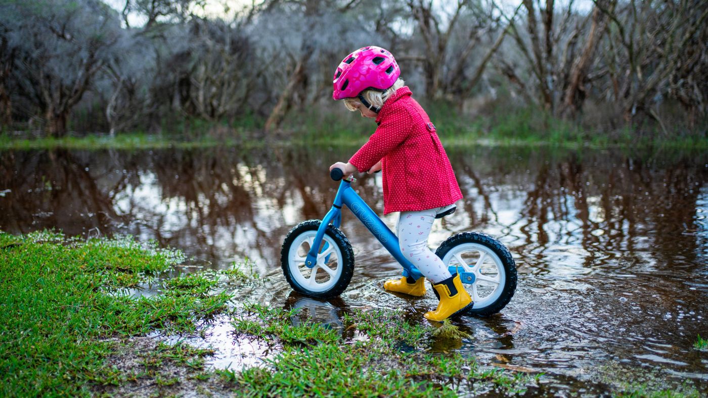 Child on a balance bike