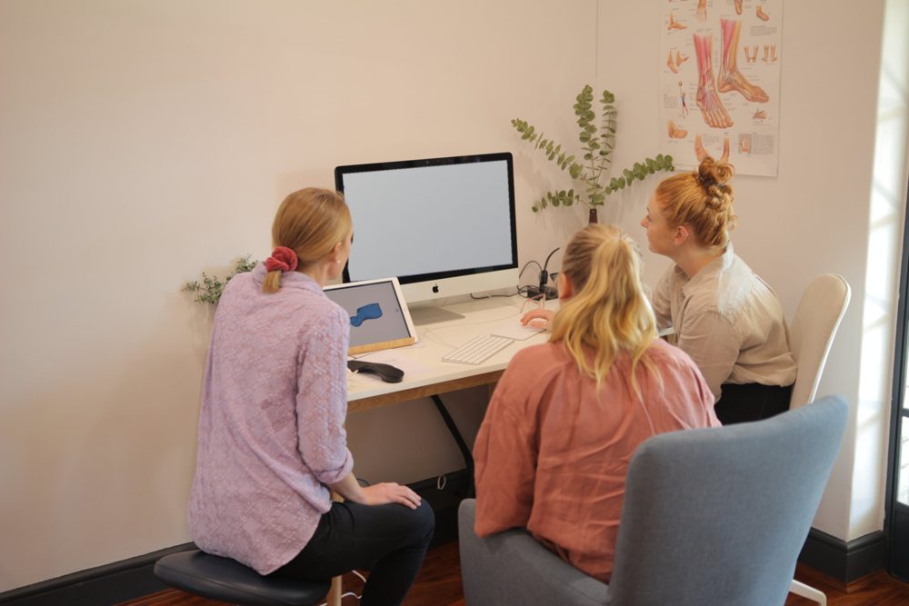 Podiatrists designing custom orthoses from a 3D foot scan