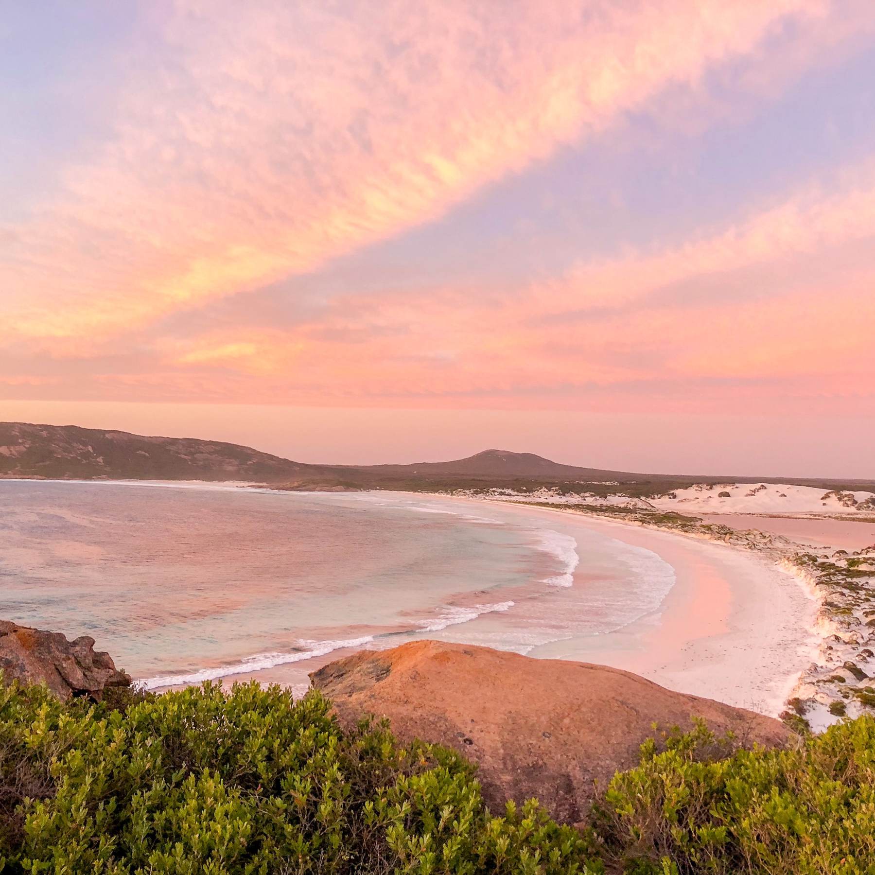Pink sunset over a quiet beach